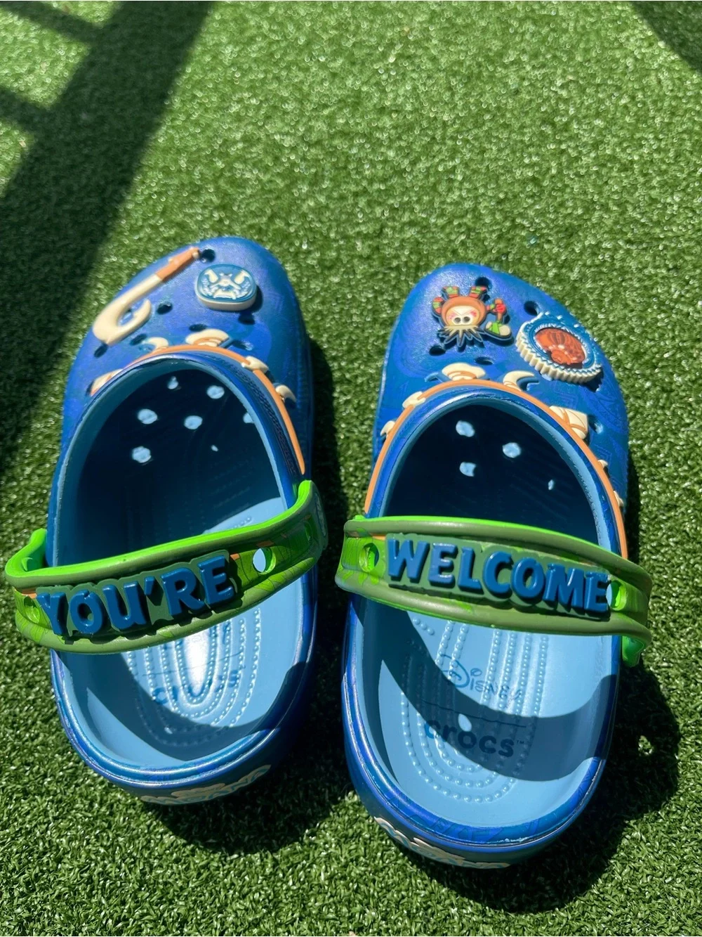 CROCS Moana Kids Blue Clog with Neon Green Strap and Ocean Charm Accents